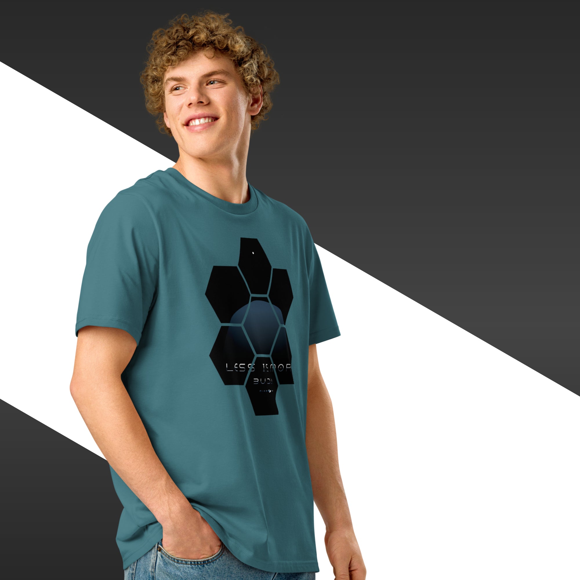 Person wearing a teal t-shirt with a black geometric design on a black, white, and gray background