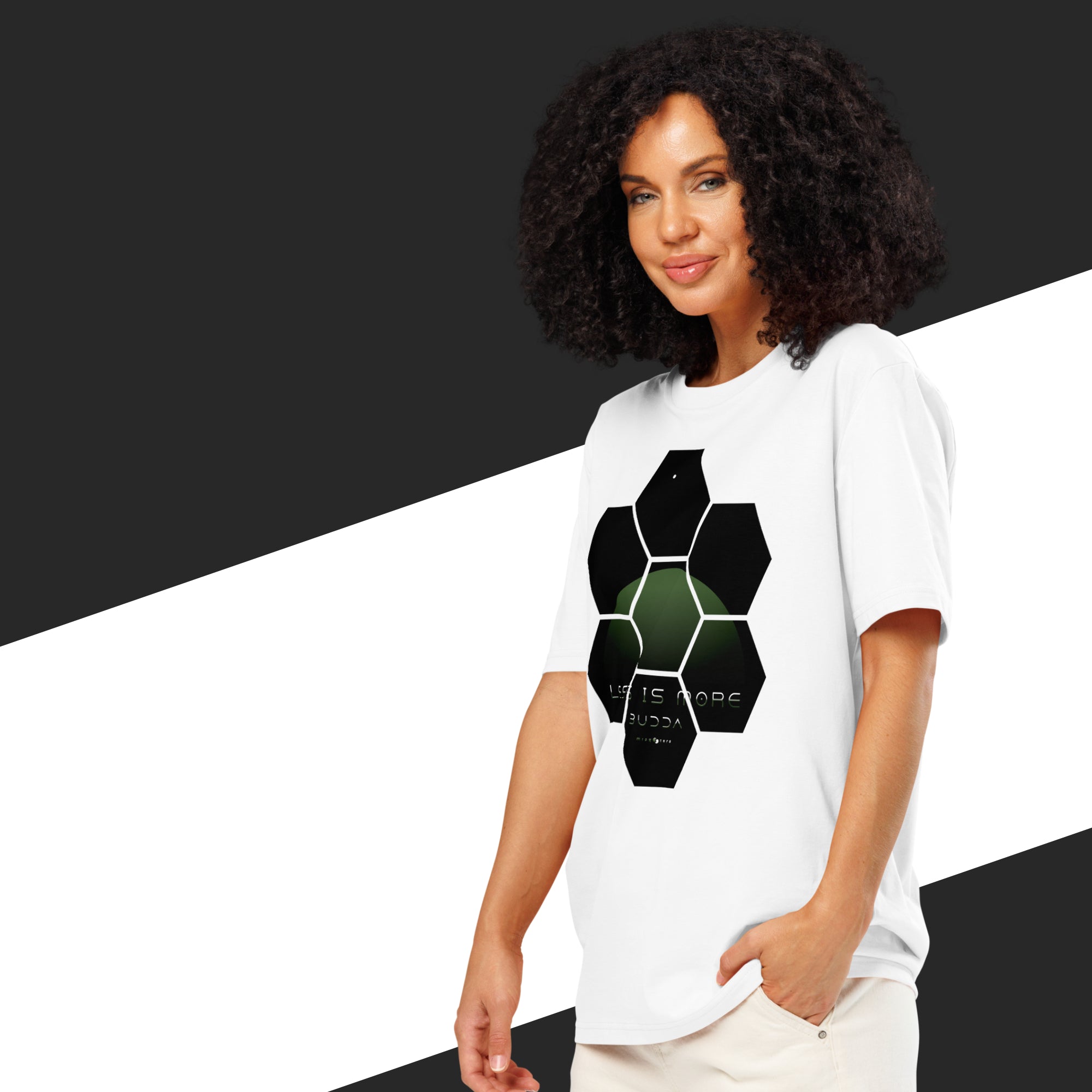 Woman wearing a white t-shirt with a black geometric design on a black and white background