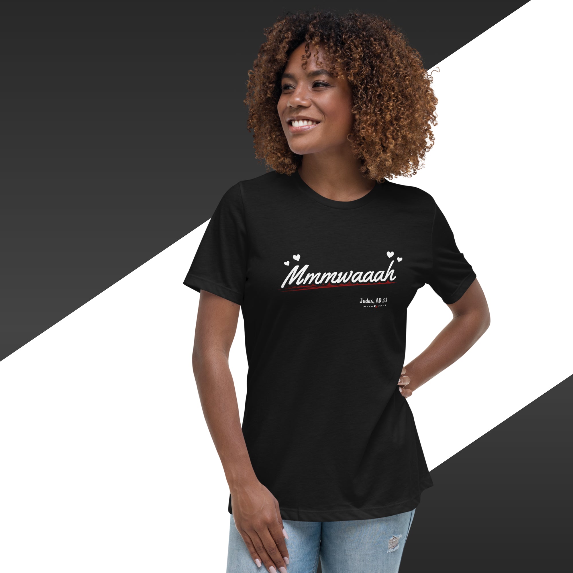 Woman wearing a black t-shirt with 'Mmmwaah' text on a black and white background