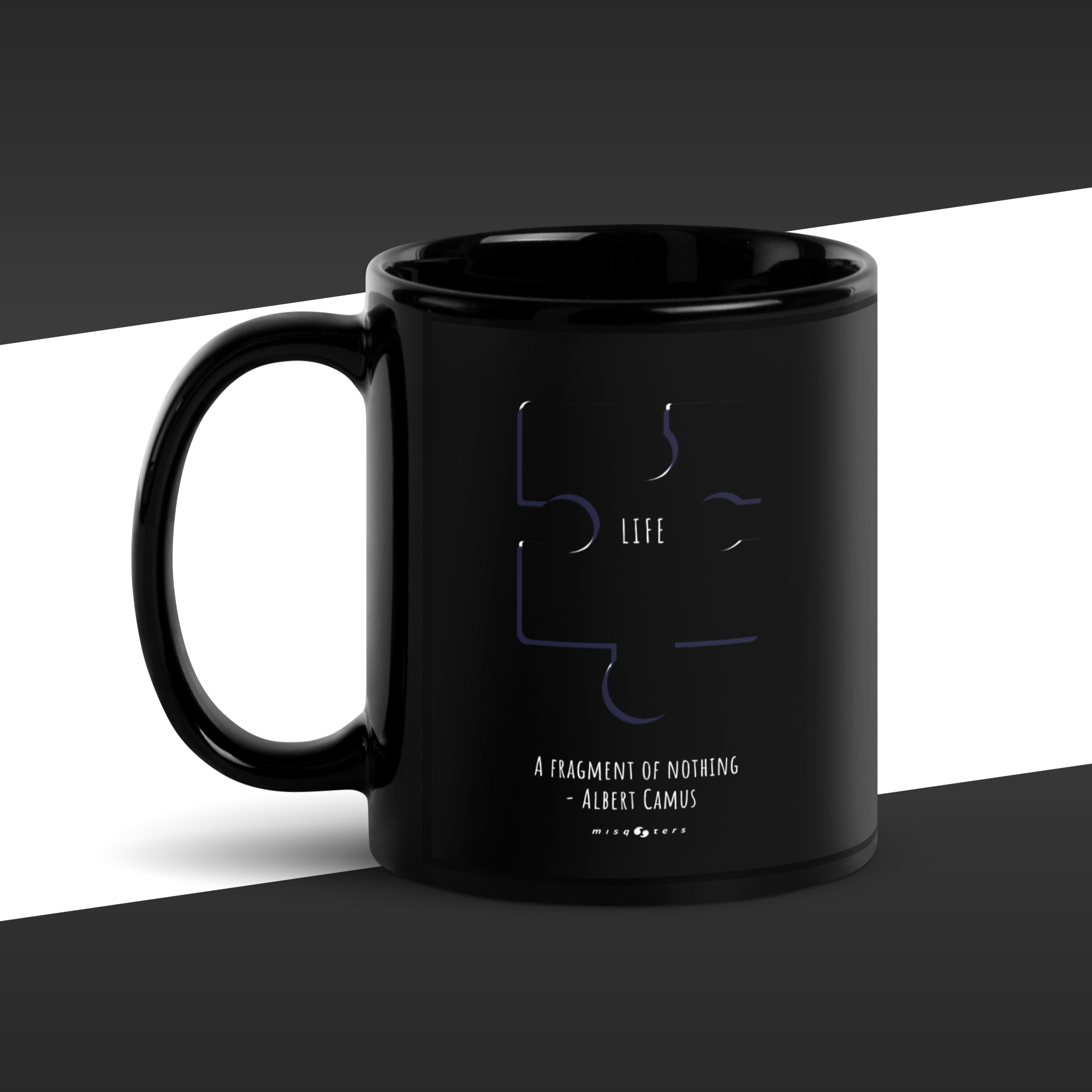 Black mug with a design and text on a black and white background