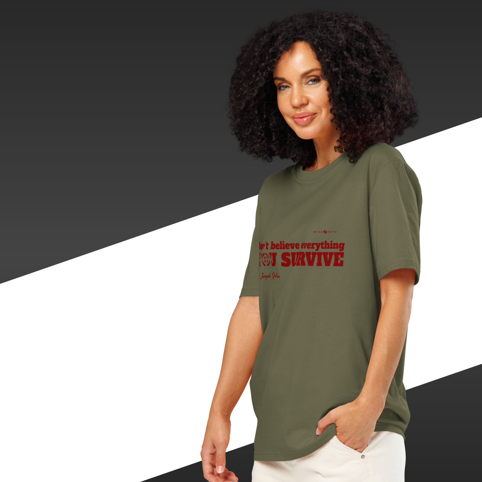 Woman wearing a green t-shirt with red text on a black and white background