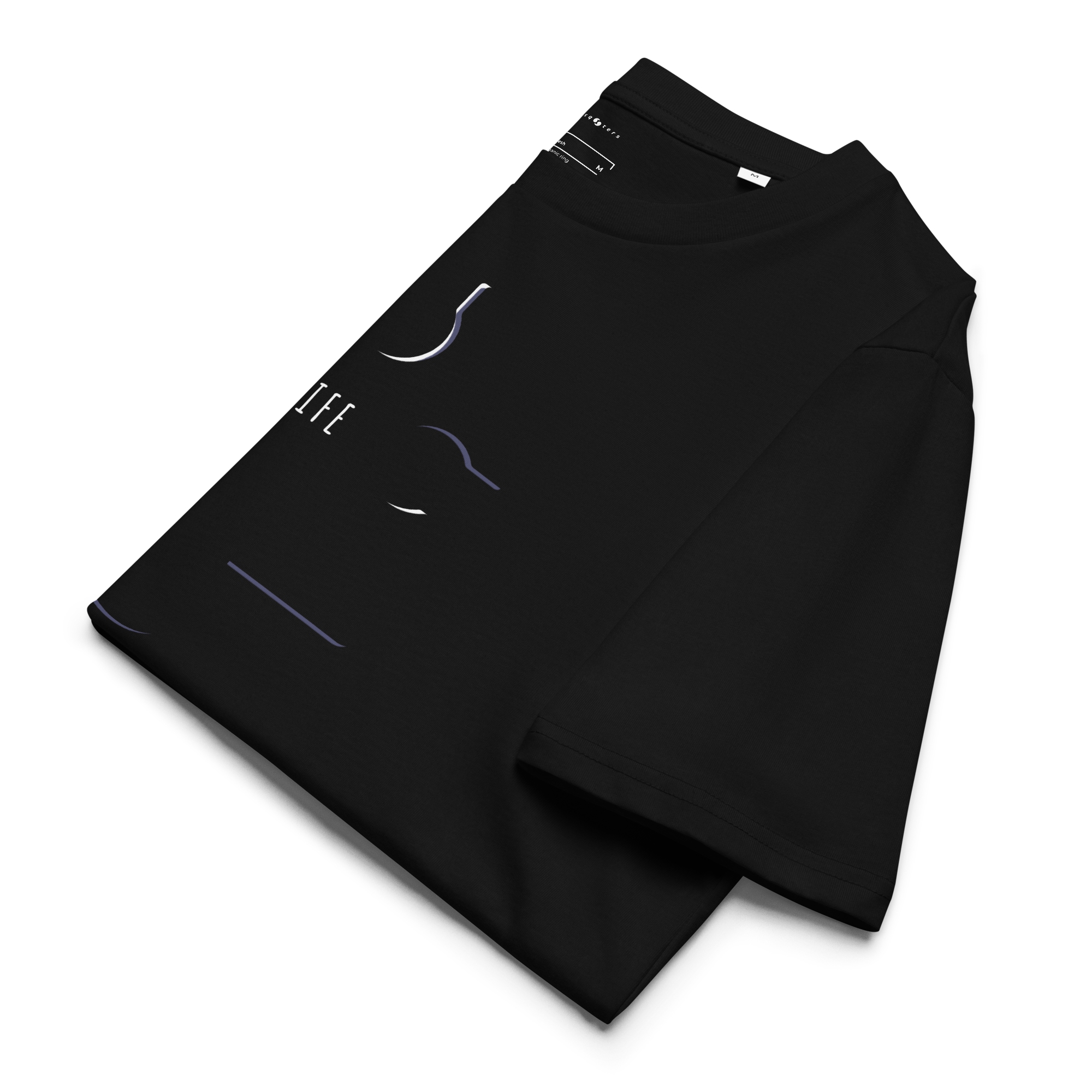 Folded black t-shirt with a brand label on a white background