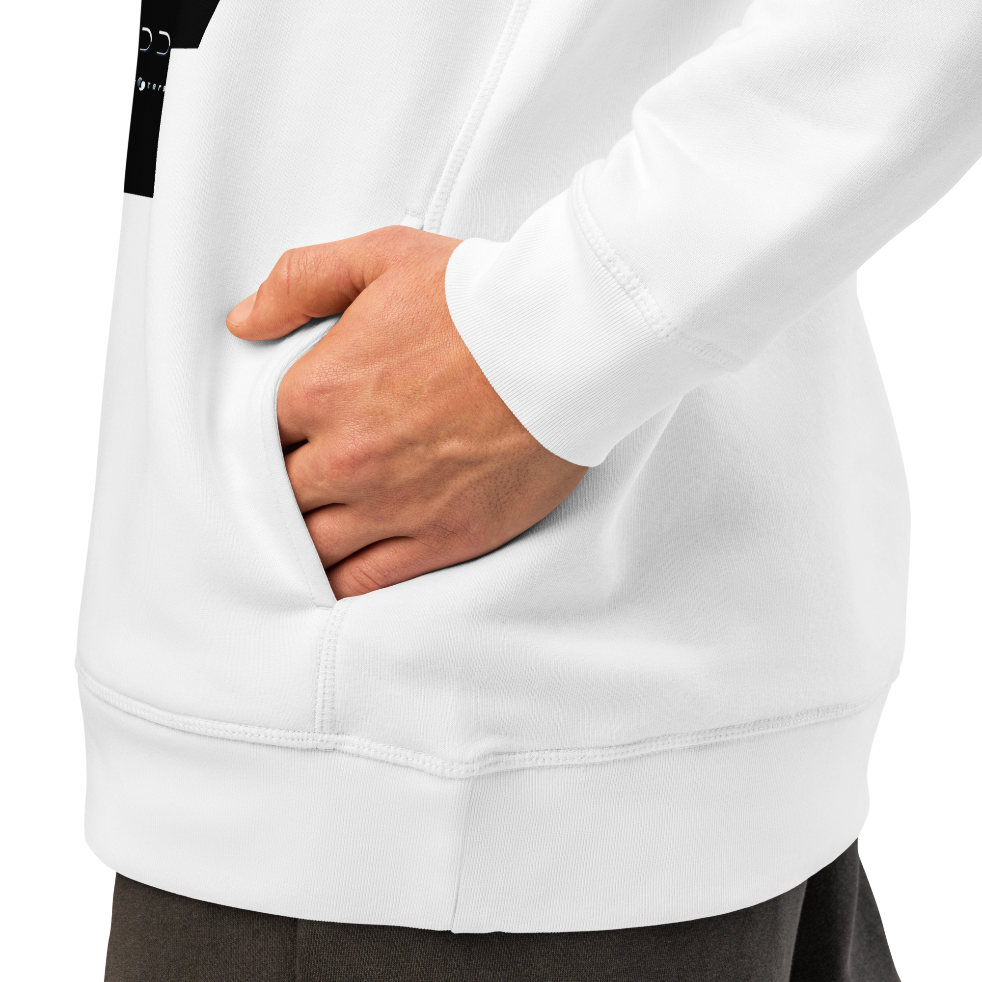 Person wearing a white hoodie with a hand in the pocket on a light gray background