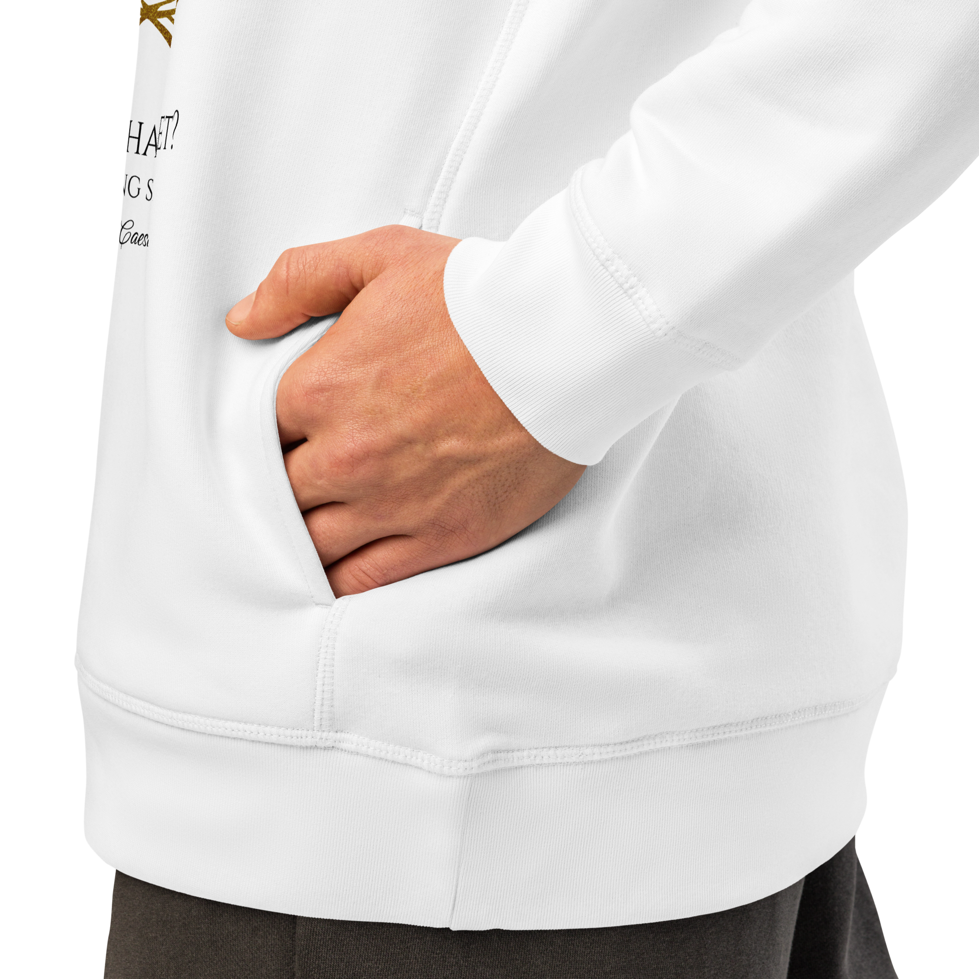White hoodie with text on sleeve, worn by a person with hand in pocket.